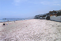 Beach at La Jolla Shores in the summer - beach is sandy.